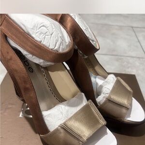 Bebe Satin Platform Heels in Brown and Gold
